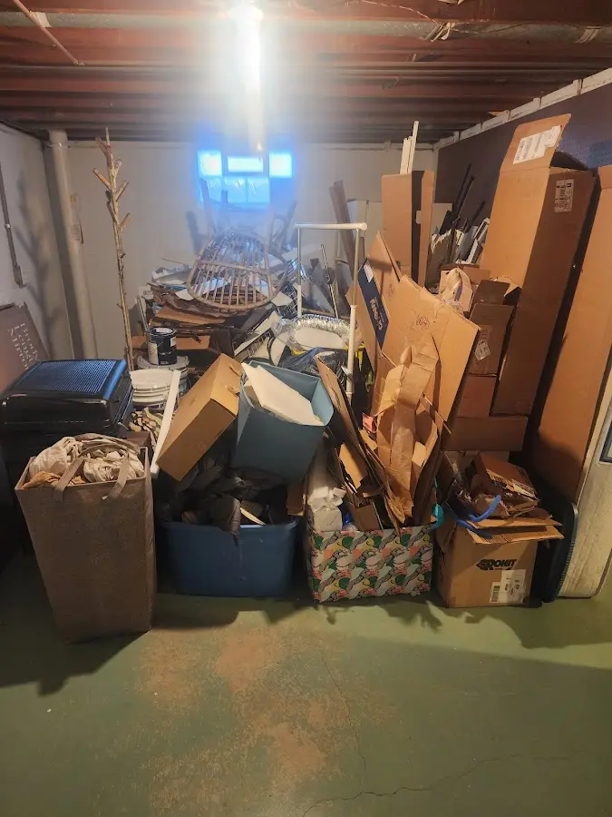 Roll-off dumpster container at job site for 4 Yard Dumpster Rental in Poinciana